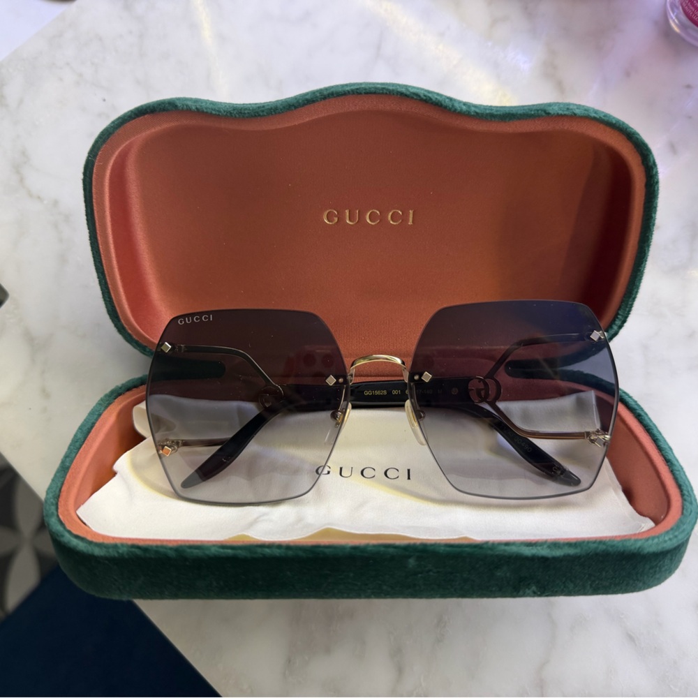 Gucci Black and Gold Sunglasses with Green Case